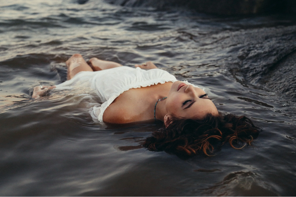 woman floating woman floating illustrates peaceful feeling from craniosacral session
